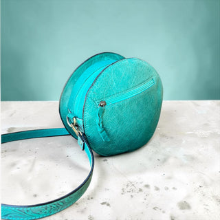 Turquoise tooled leather & cowhide canteen bag