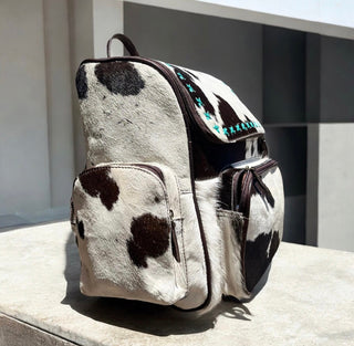 All cowhide turquoise backpack