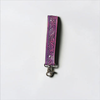 Purple tooled leather wristlet