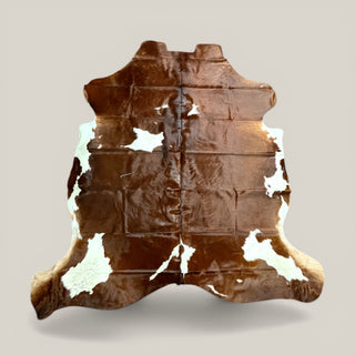 6-7’ Brazilian cowhide rug (j16)