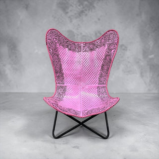 Pink tooled leather butterfly chair