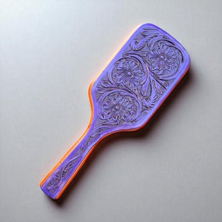 Purple tooled leather hairbrush