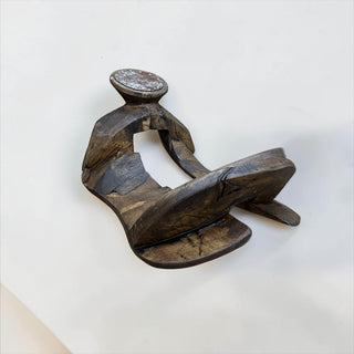Tan cowhide wood saddle decor