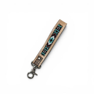 Turquoise Aztec tooled leather wristlet strap