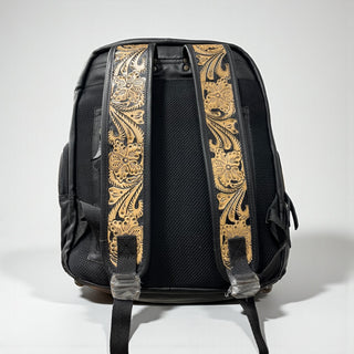 Floral tooled leather & cowhide backpack