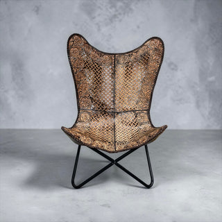 Brown tooled leather butterfly chair