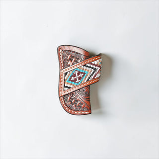 Tan tooled leather Aztec knife sheath