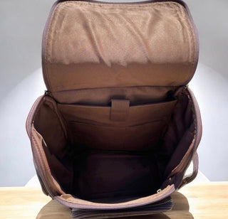 Purple fringe tooled leather & cowhide backpack