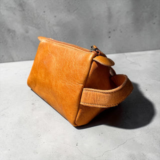 Orange BootStitch toiletry bag