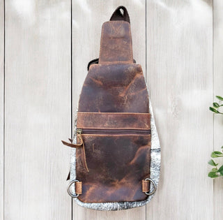 Black/white all cowhide sling bag