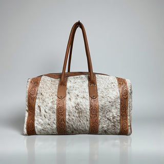 Tan tooled leather & cowhide duffle bag