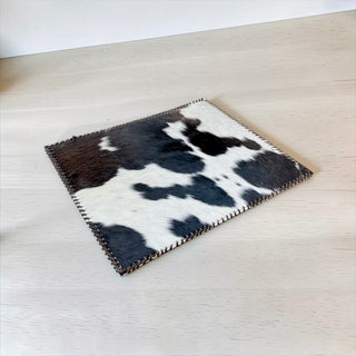 Black all cowhide placemat