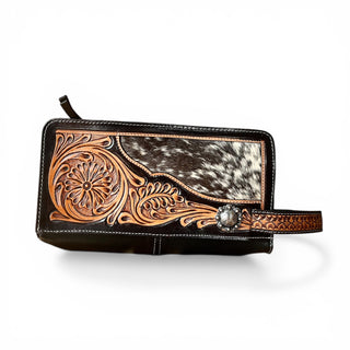 Brown tooled leather toiletry bag