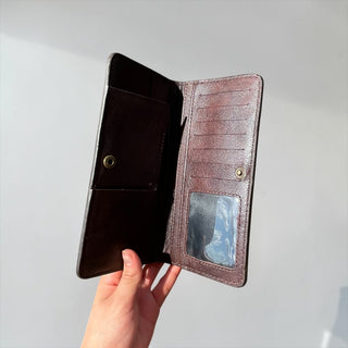 Beige tooled leather wallet