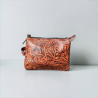 Orange floral embossed leather makeup bag