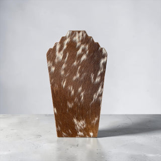 Tan cowhide necklace display