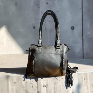 Black fringe leather handbag