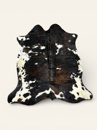 5-6’ Brazilian cowhide rugs (B50)