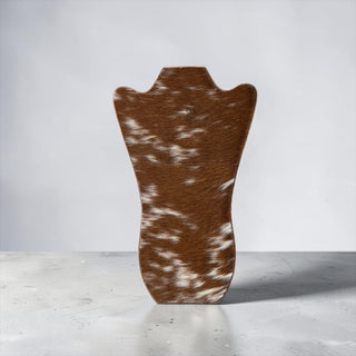 Tan cowhide necklace display