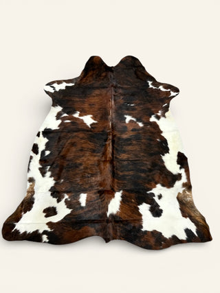 6-7’ Brazilian cowhide rug (b67)