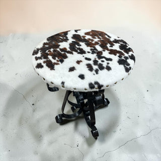 Round cowhide accent table