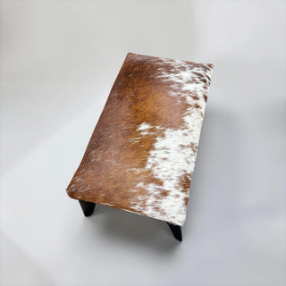 Exact cowhide ottoman