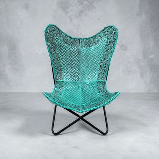 Turquoise tooled leather butterfly chair