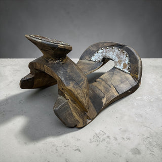 Tan cowhide wood saddle decor