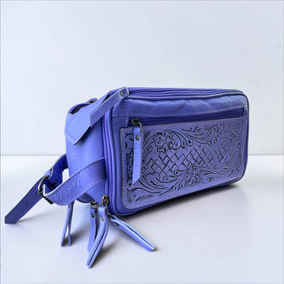 Purple tooled leather toiletry bag