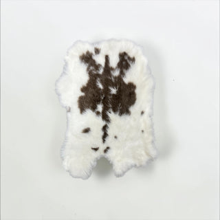 Brown naturally spotted fur hide
