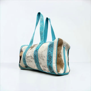 Turquoise tooled leather & cowhide duffle bag