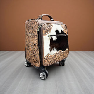 Brown tooled leather & cowhide luggage