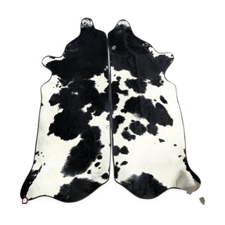 Black border matching sets 6-7’ cowhide rug (d)