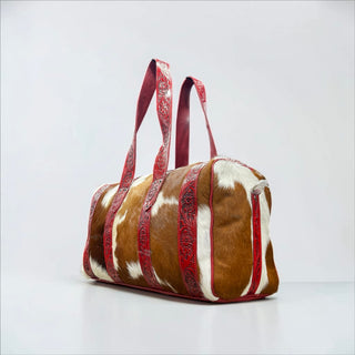 Red tooled leather & cowhide duffle bag