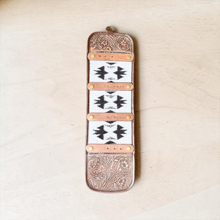 Brown tooled leather buckle holder