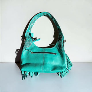 Turquoise cowhide fringe shoulder bag