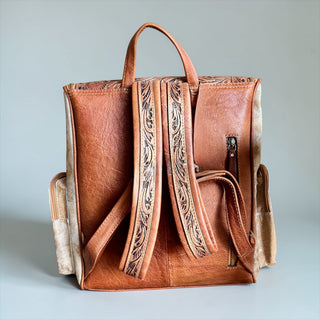 Turquoise feathers tooled leather & cowhide backpack