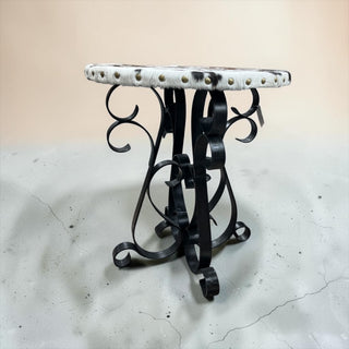 Round cowhide accent table
