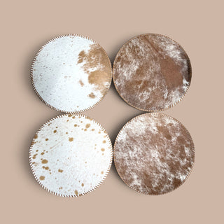 All tan cowhide round placemats-set of 4