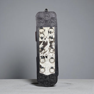 Black tooled leather & cowhide scarf holder