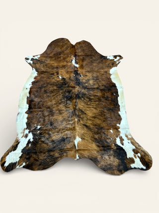 5-6’ Brazilian cowhide rug (b59)