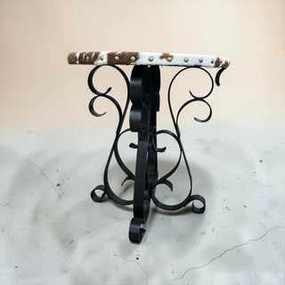 Round cowhide accent table