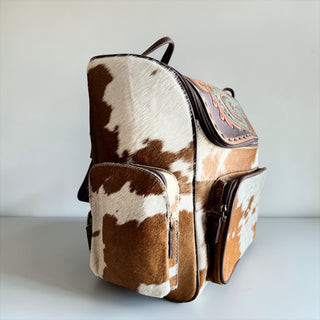 Turquoise feathers tooled leather & cowhide backpack