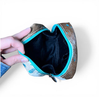 Tan all cowhide makeup bag