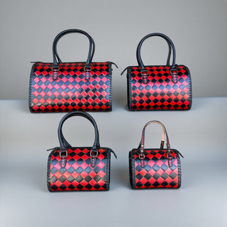 Red checker tooled leather speedy bag