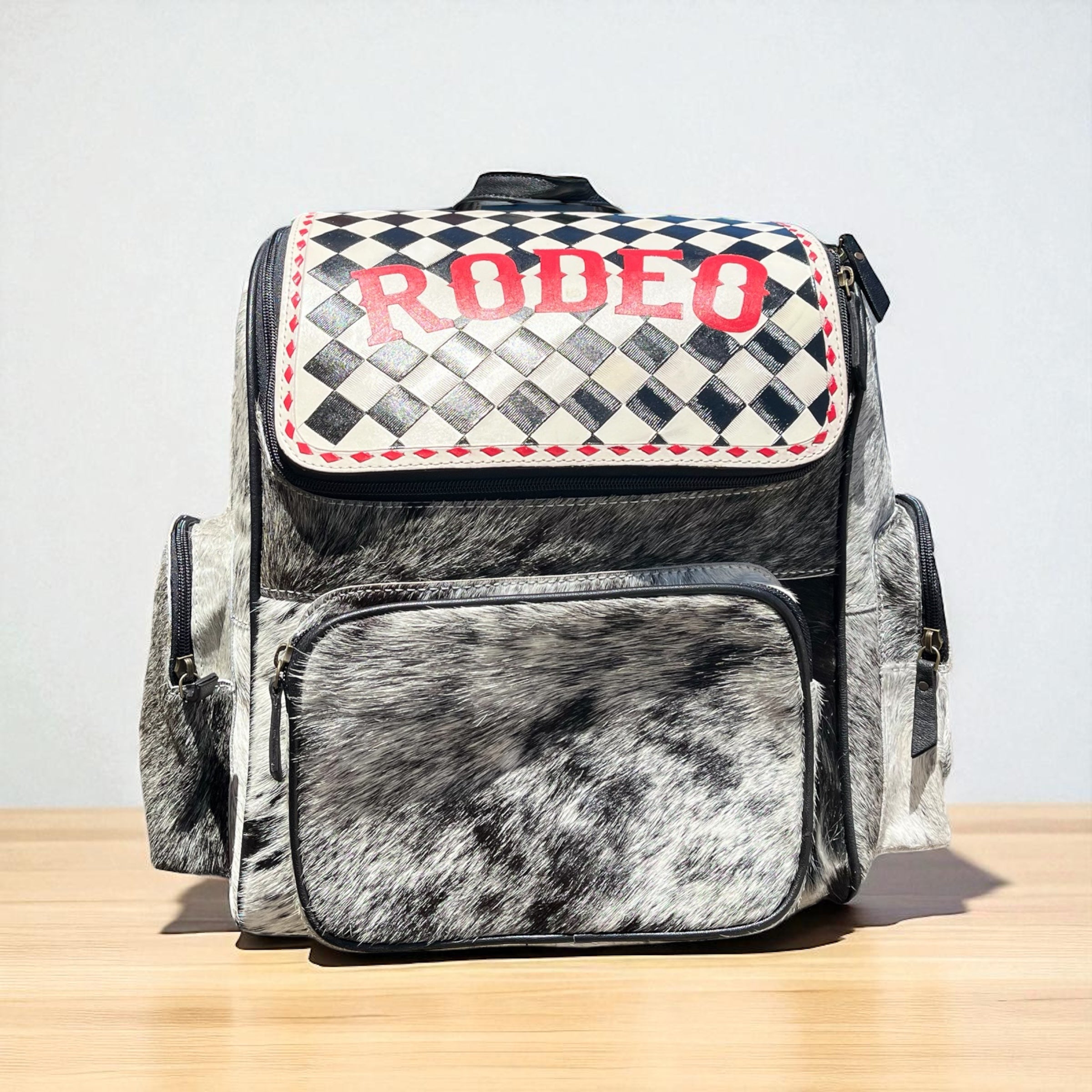 Rodeo checker tooled leather & cowhide backpack – Western Linens