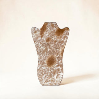 Tan cowhide necklace display