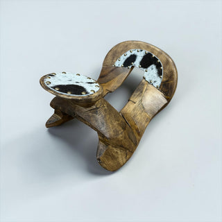 Black/white cowhide wood saddle decor