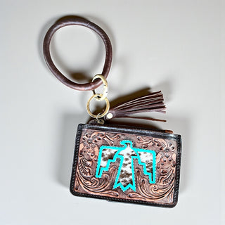 Turquoise thunderbird tooled leather & cowhide wristlet