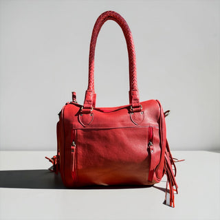 Red fringe leather handbag